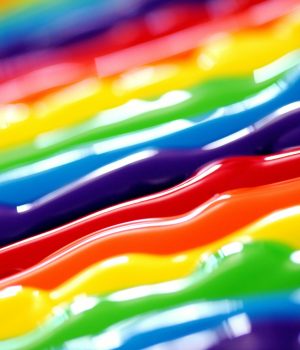pexels-photo-1174952-1174952 A vibrant abstract background featuring flowing rainbow colors in a creative artistic style.